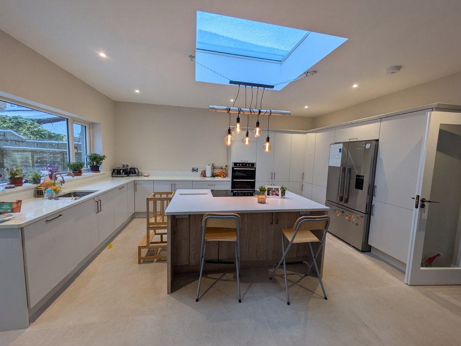 Custom-fitted kitchen in Limerick by AR Construction featuring island unit and skylight.